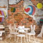 Hot Air Balloon with Young People on Brick Wallpaper Mural